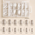 Estuche de tips transparentes forma coffin, 240 piezas.